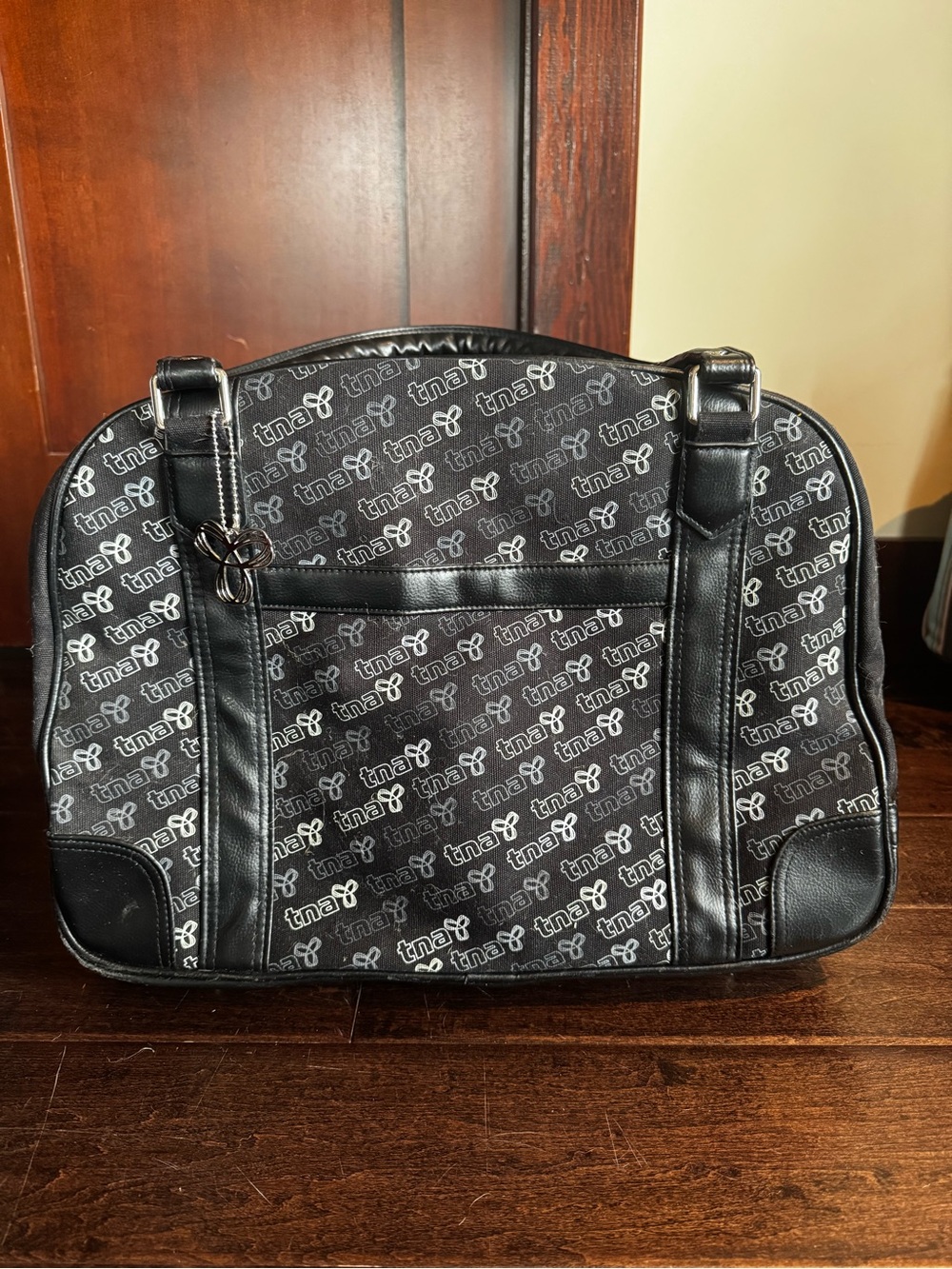 TNA Black Logo Pattern Duffel Bag